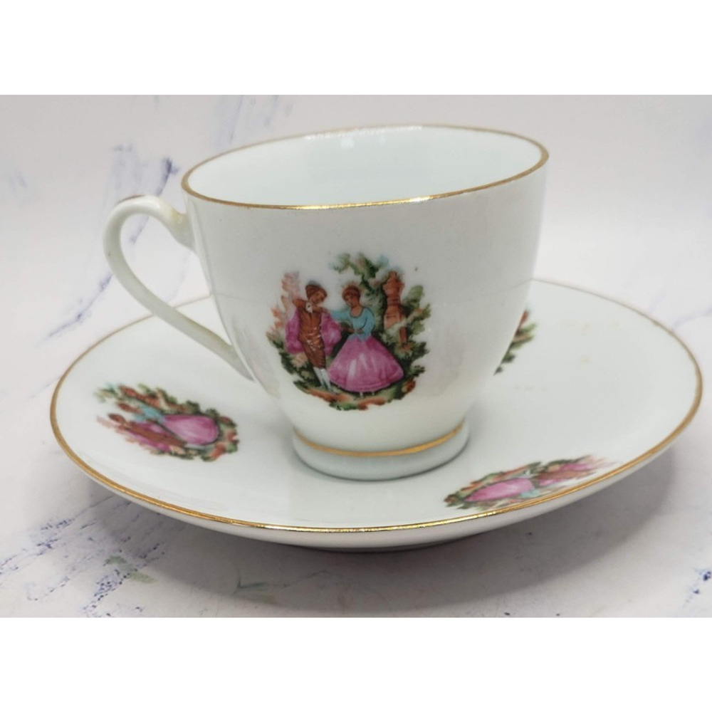 Vintage Porcelain Tea Cup and Saucer White w/Gold Trim and Dancing Couple